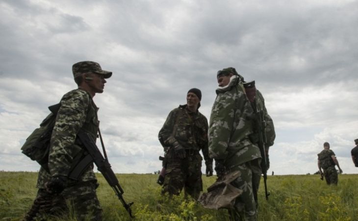 Ополченцы и силовики производят обмен погибшими в Луганске