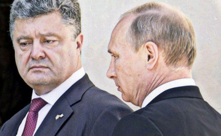 Путин и Порошенко договорились по телефону о прекращении боев в Донбассе