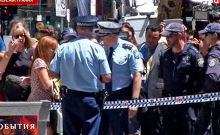 Сотни людей пришли почтить память погибших в Сиднее