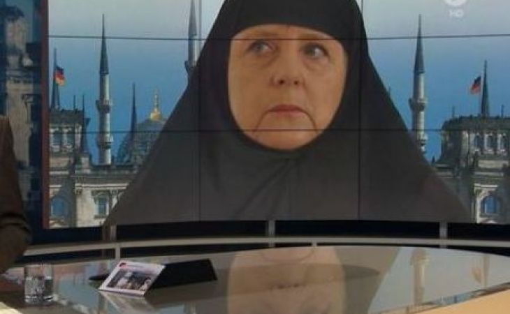 Коллаж с Ангелой Меркель привел к политическому скандалу
